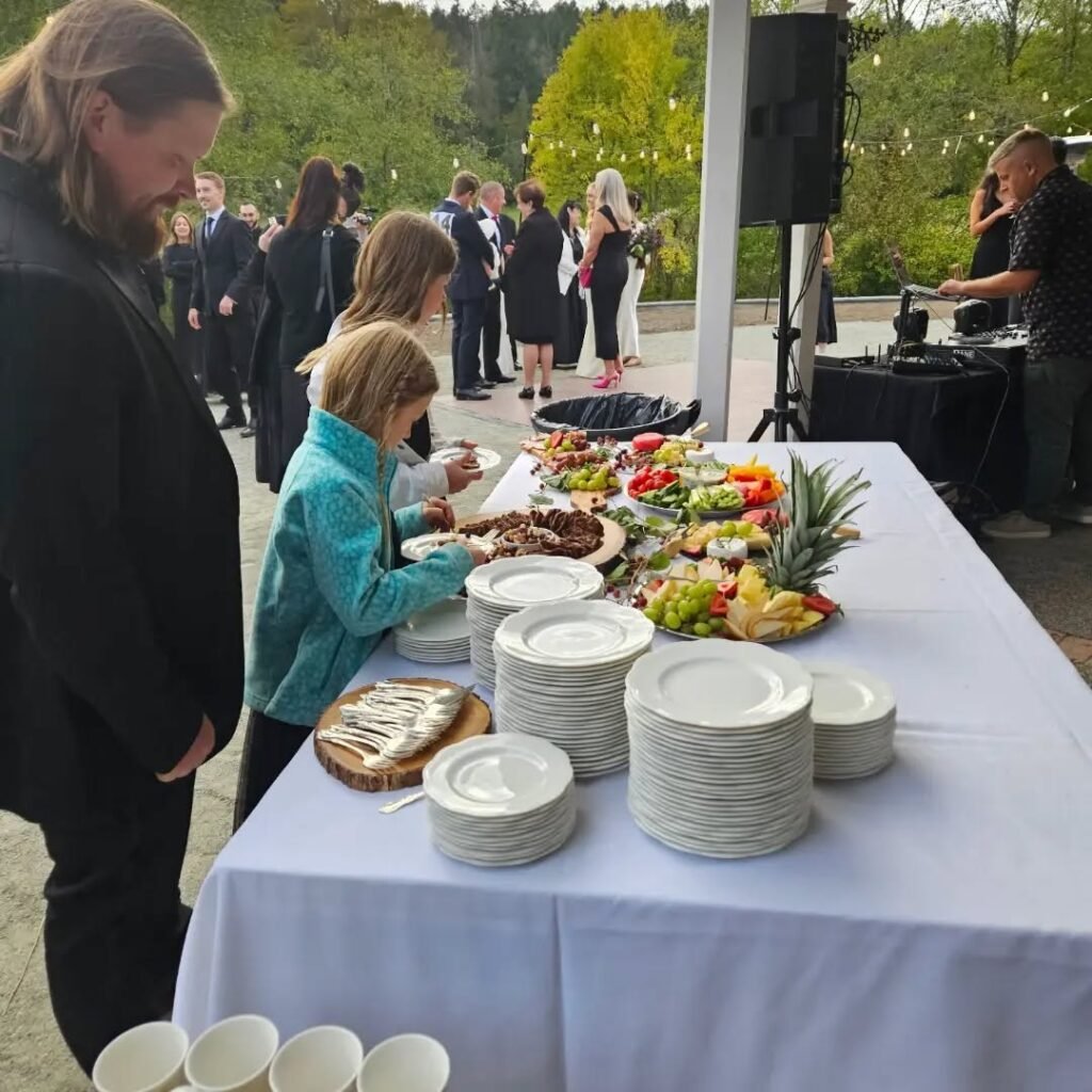 Charcuterie board and plates at a wedding caterering
