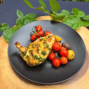 Grilled Honey and herb chicken with charred tomatoes and potatoes
