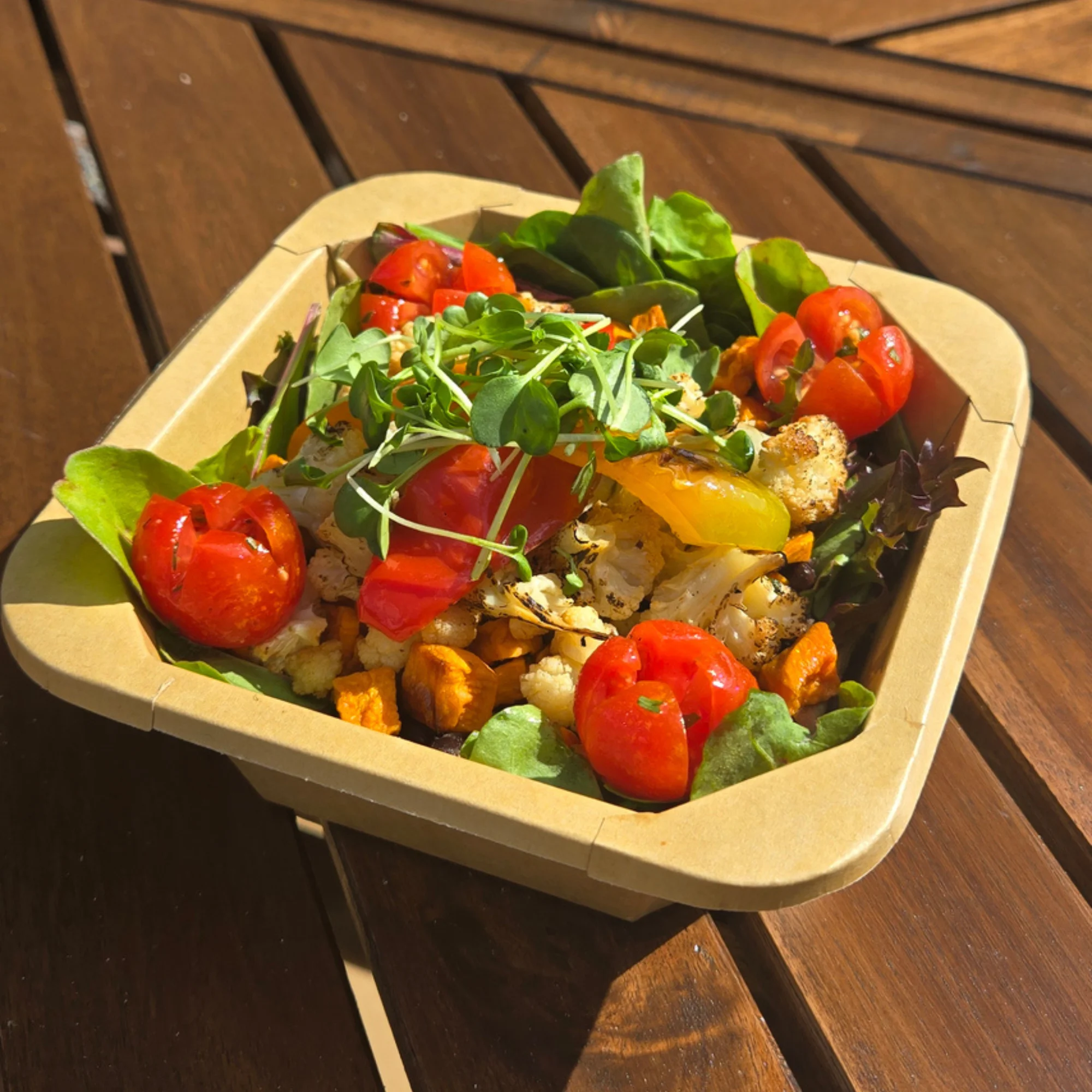 Healthy grilled chicken bowl catered by Fyrestoke